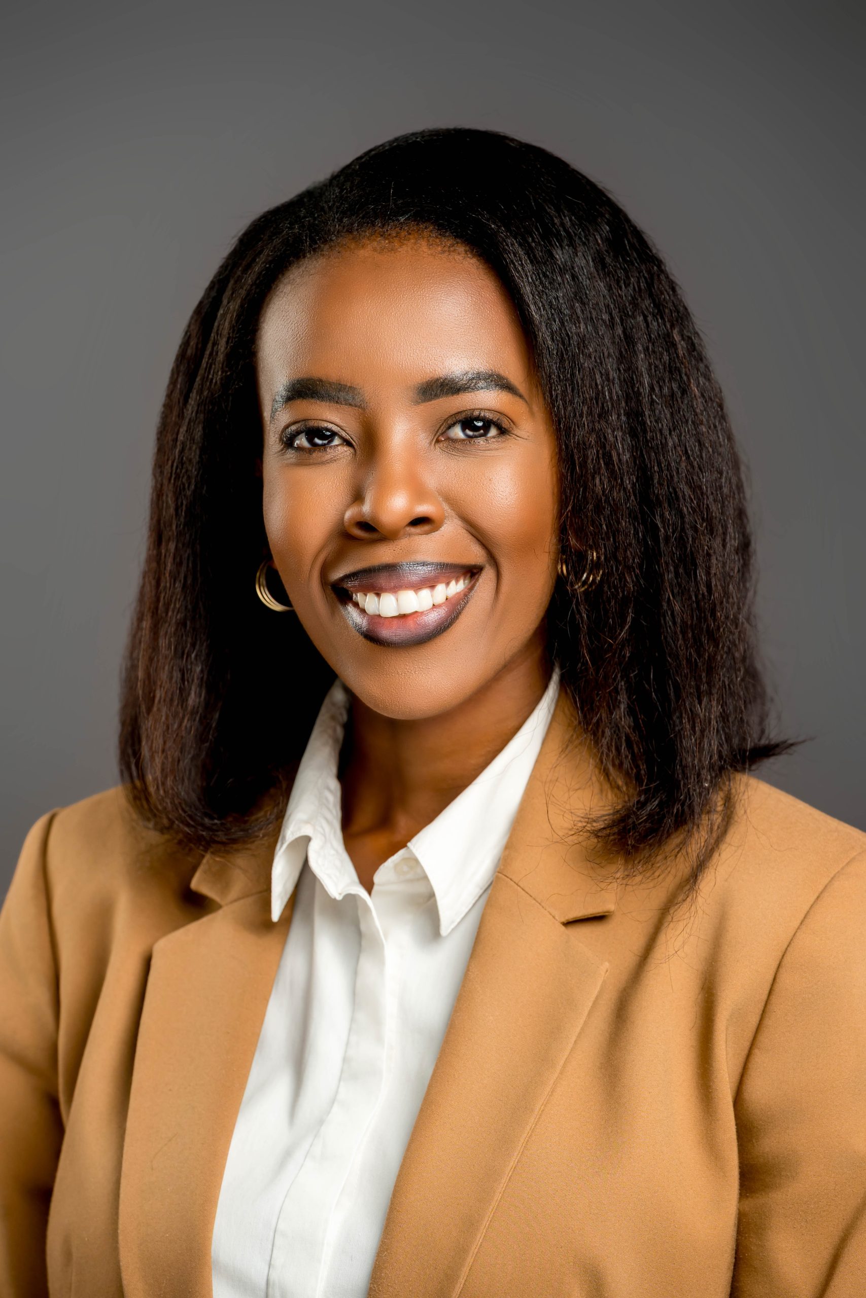 Professional corporate headshot of a woman